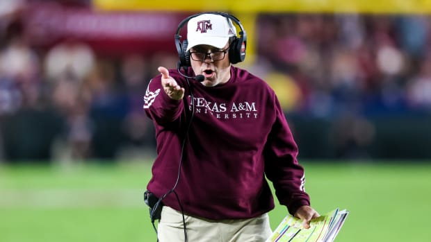 Oct 22, 2022; Columbia, South Carolina, USA; Texas A&M Aggies head coach Jimbo Fisher directs his team against the South Carolina Gamecocks in the second quarter at Williams-Brice Stadium. Mandatory Credit: Jeff Blake-USA TODAY Sports